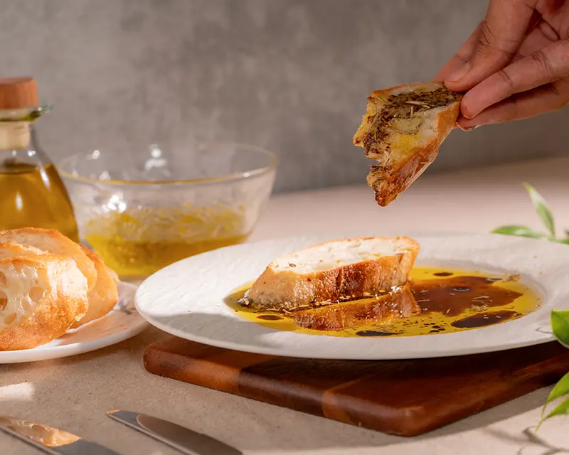 Best salts for olive oil bread dip with bread dipped in olive oil
