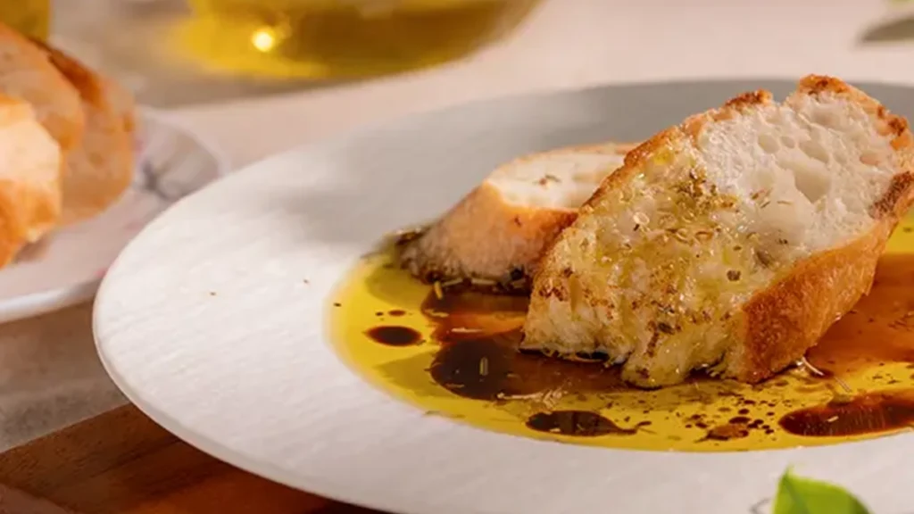 Olive oil bread dip with finishing salt and herbs