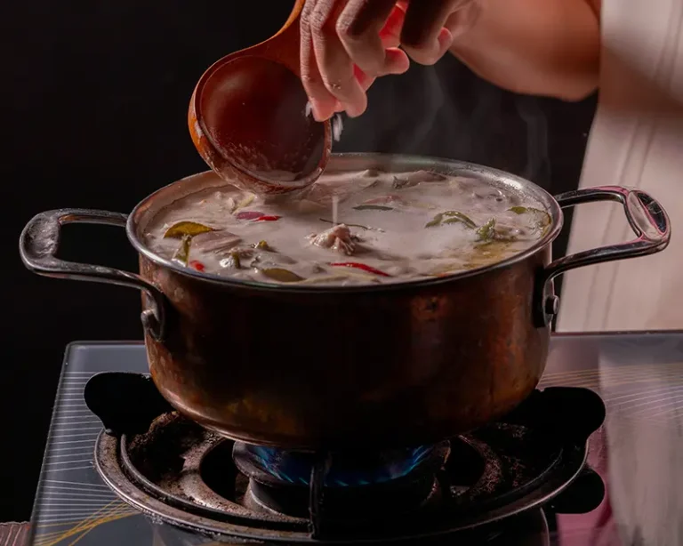 How salt affects flavour by helping aroma rise from hot tom kha kai during cooking.