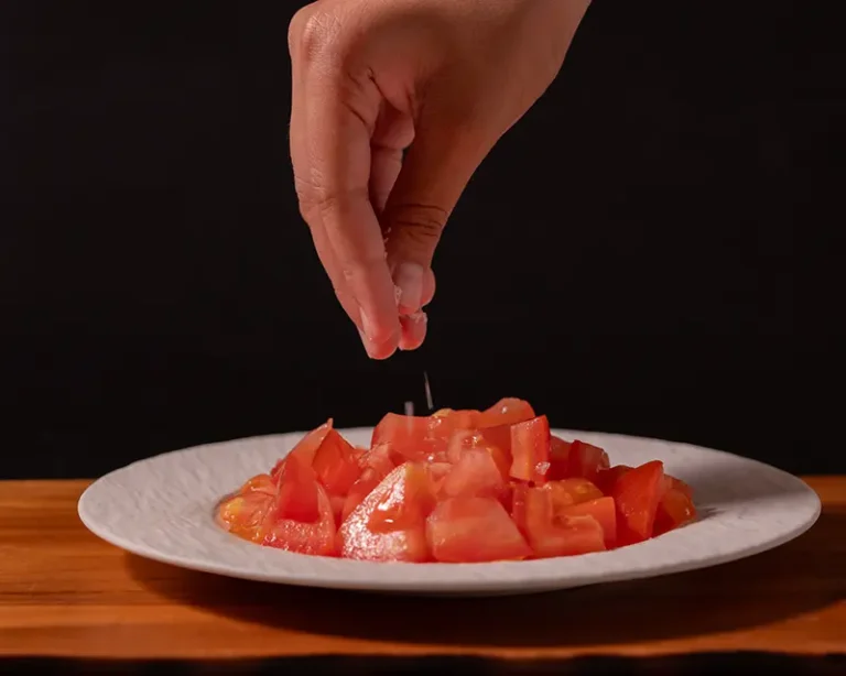 how salt moves through food as salt is added to chopped tomatoes