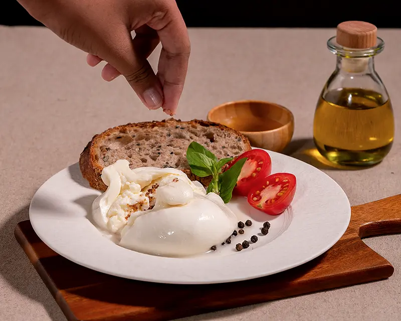 How to salt burrata after opening it at the table