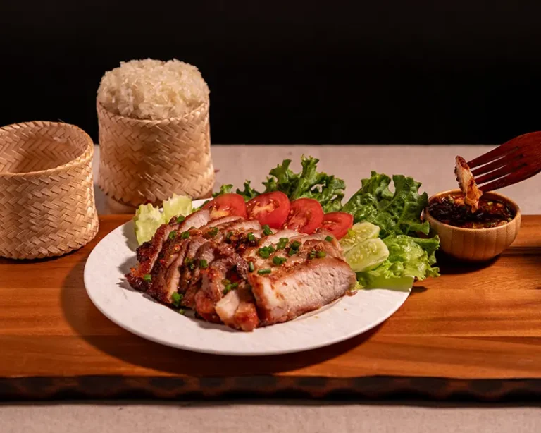 How to salt rice when sticky rice is served with grilled pork and dipping sauce.