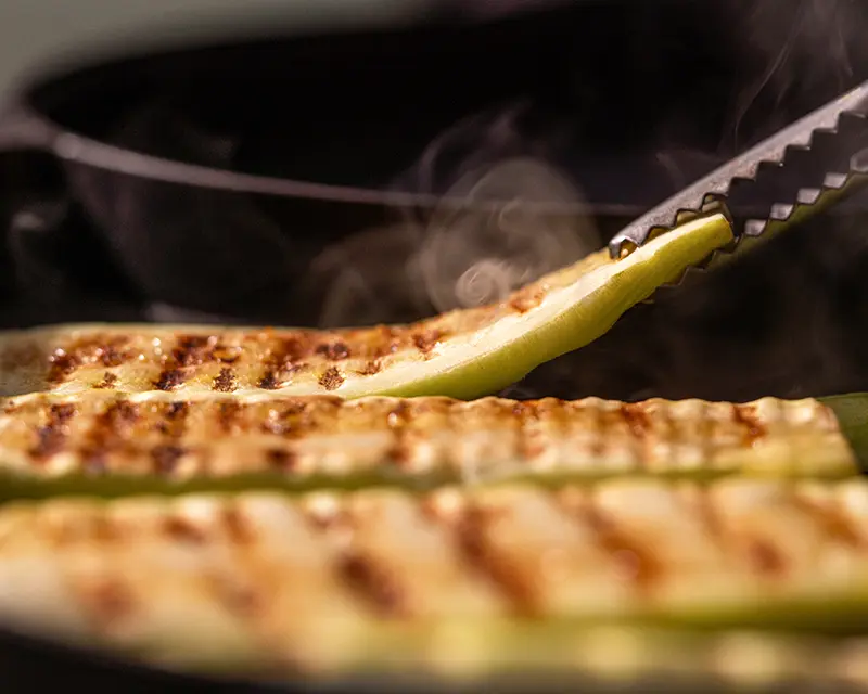 how to salt zucchini courgette in a hot pan