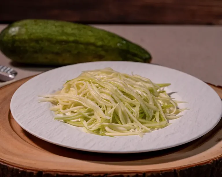 Alt text: Salted courgette ribbons for a guide on how to salt zucchini before cooking.