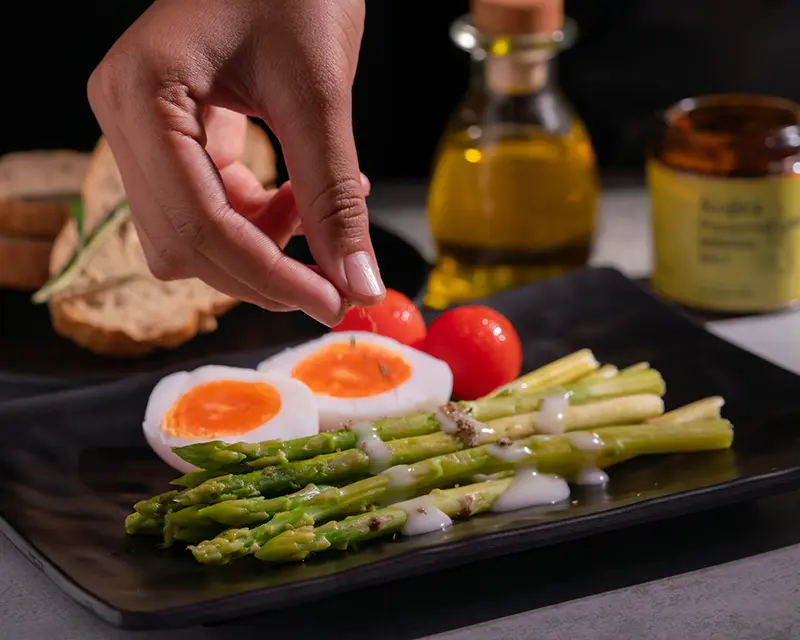 How to season asparagus with a finishing pinch of salt after cooking