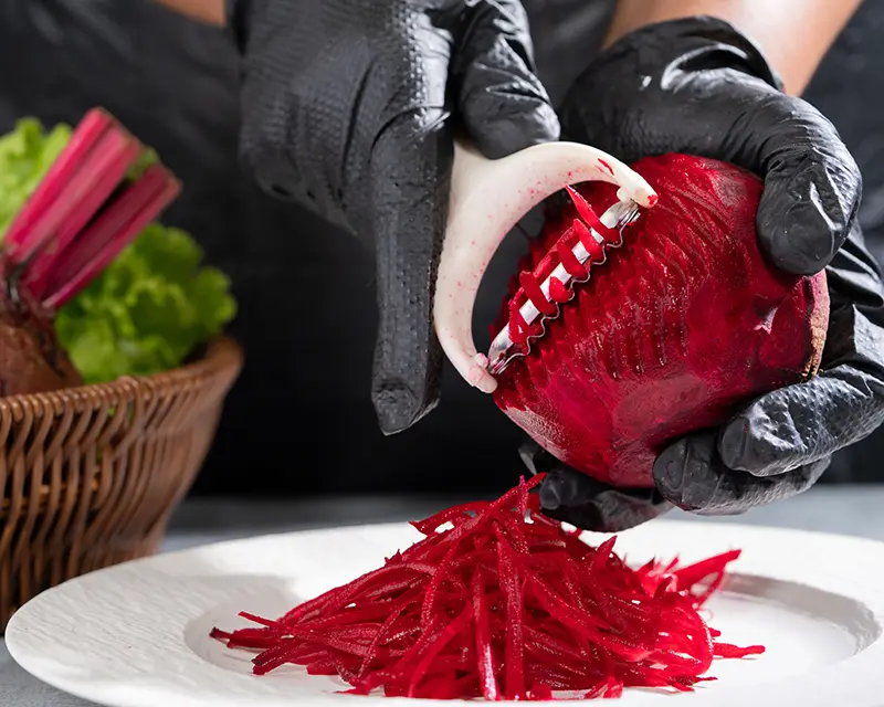 How to season beets by grating raw beet before adding dressing