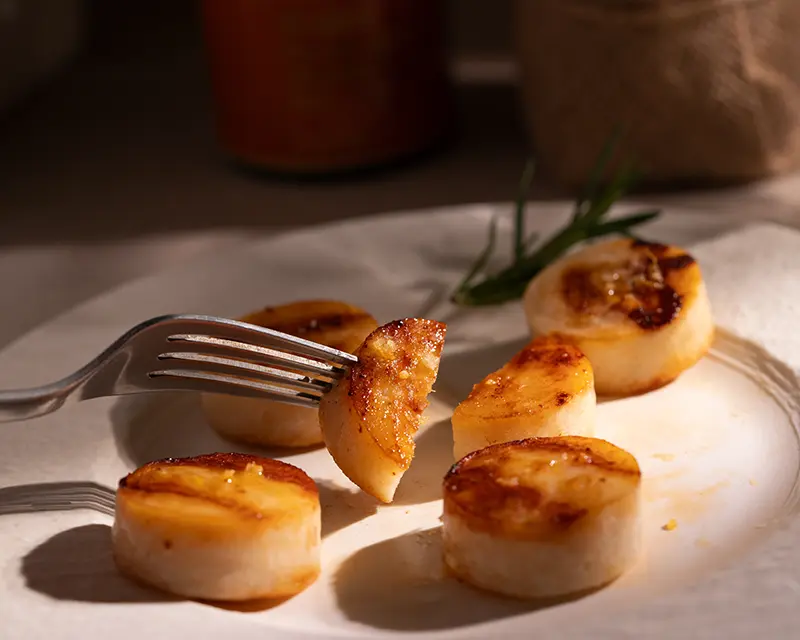 How to season scallops with a crisp golden crust and tender juicy centre.