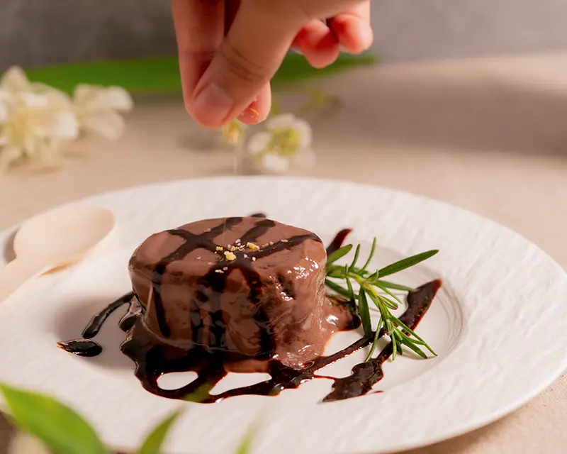 Salt on desserts with finishing salt added to a chocolate cocoa dessert