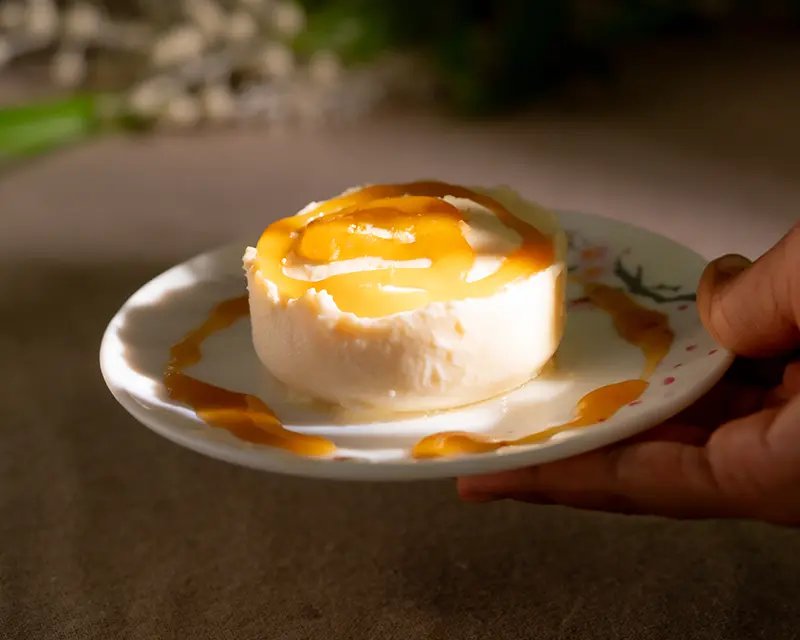 Salt on desserts with cream caramel dessert served on a small plate