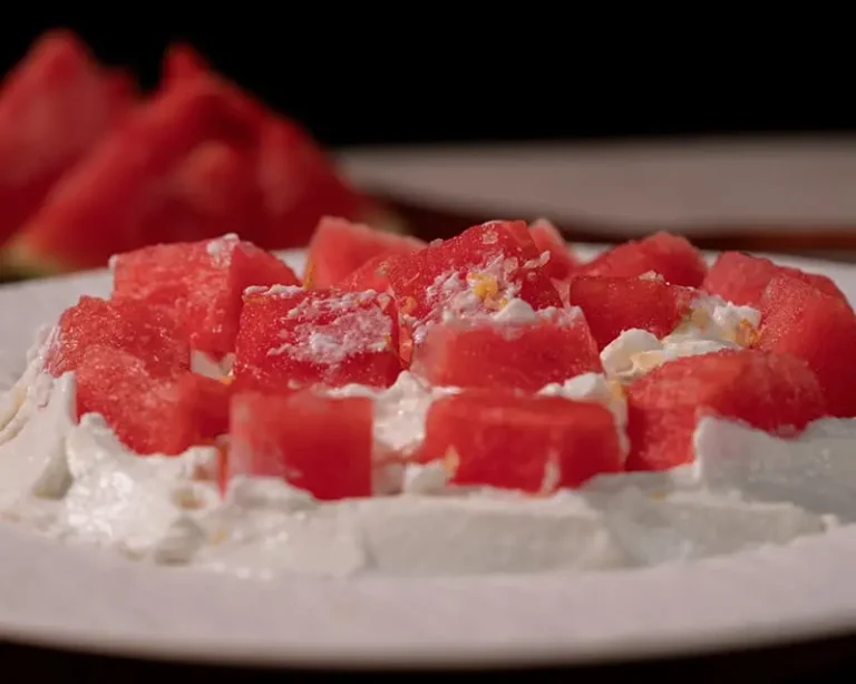 Salt on fruit with watermelon and yogurt, showing how a small pinch makes melon taste juicier and brighter.
