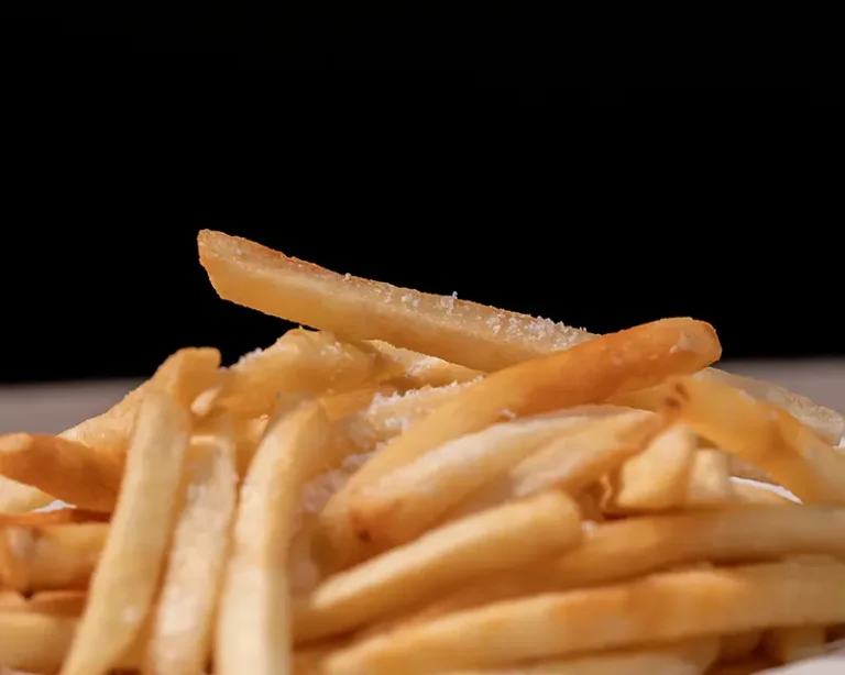 when to salt fries close up with salt crystals