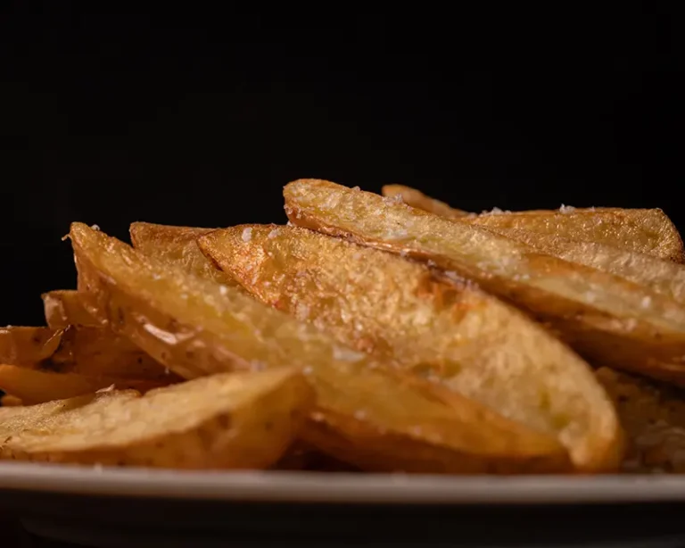 when to salt fries thick potato wedges