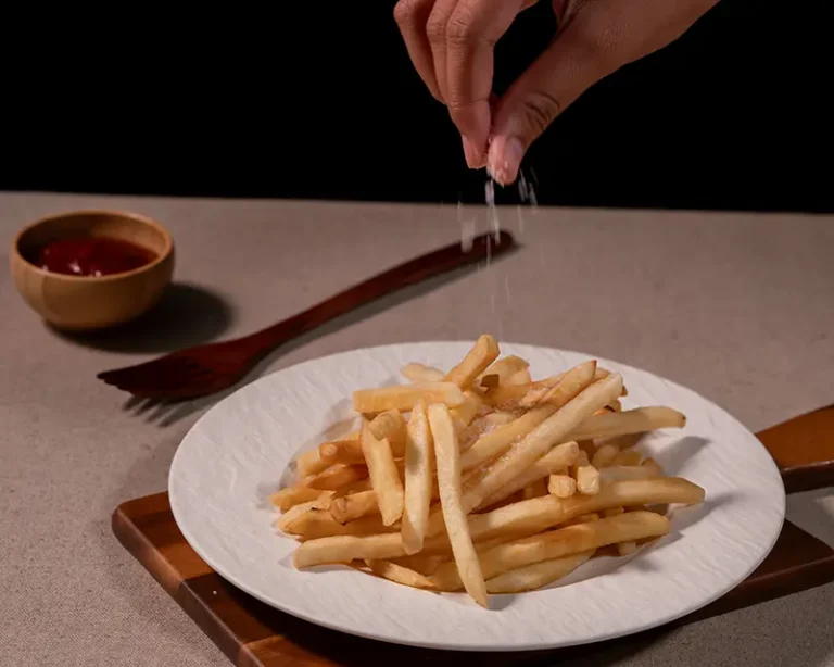 when to salt fries while hot
