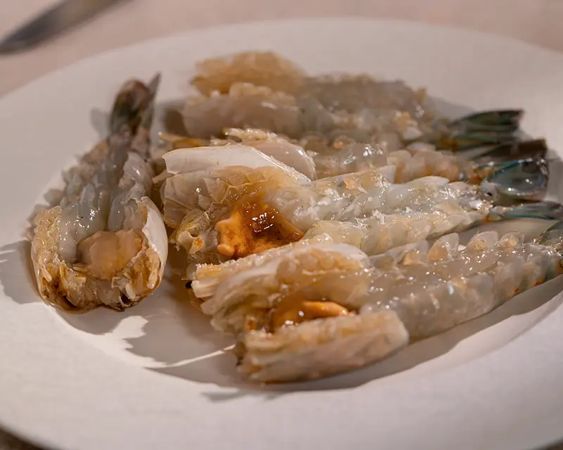 When to salt shrimp: butterflied tiger prawns with exposed flesh and shells attached