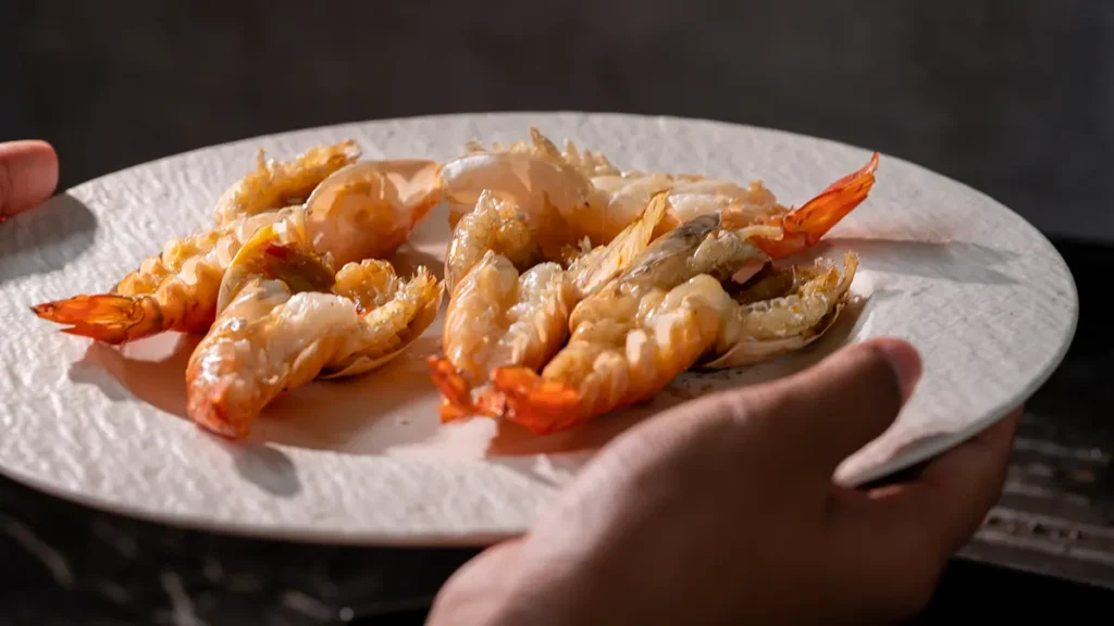 When to salt shrimp: serving hot butterflied tiger prawns straight from the grill
